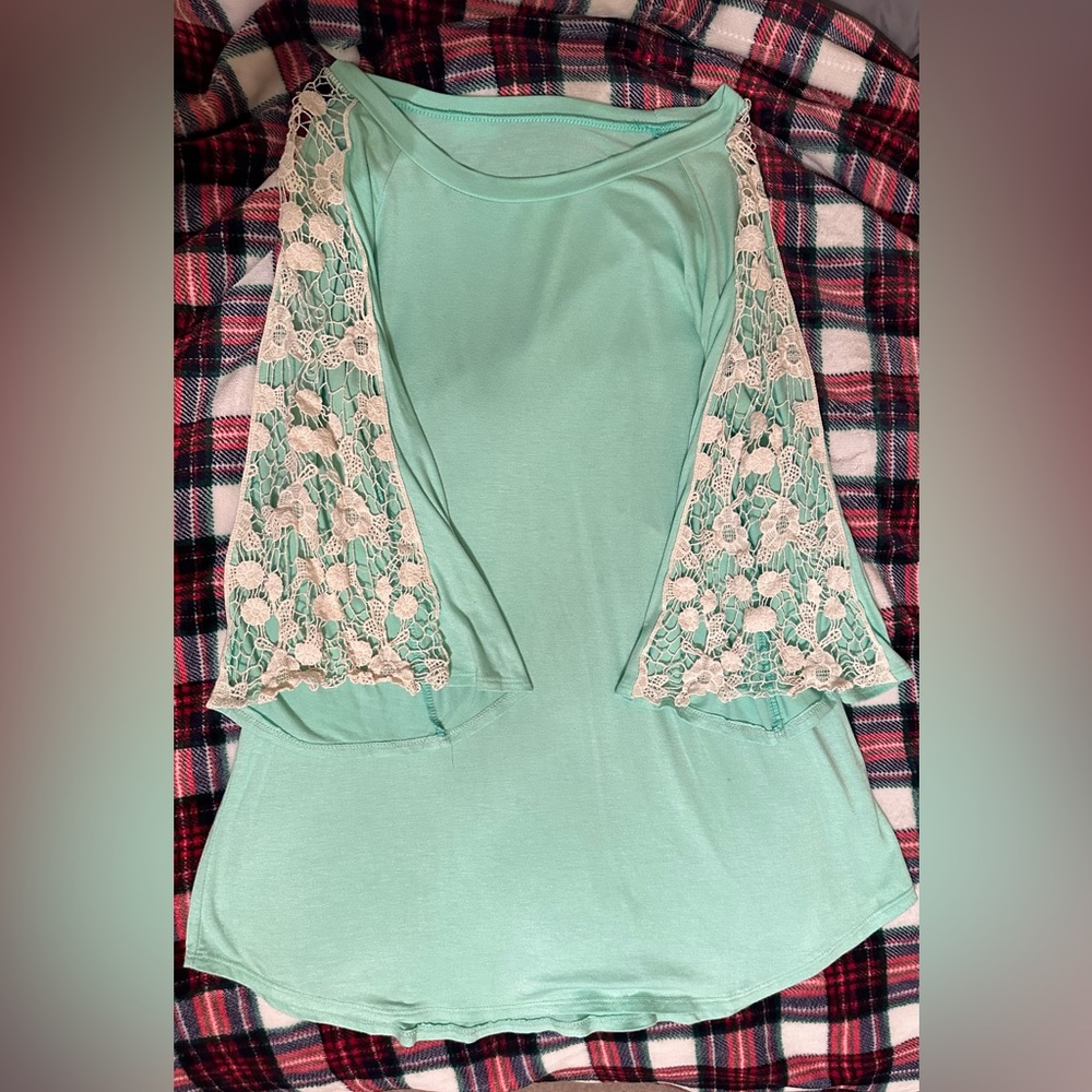 Cute Fall boutique top with lace bell sleeves on the front